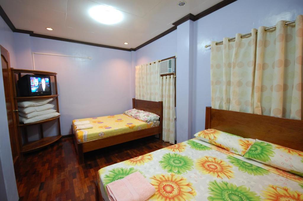 J-Lais Balai Turista - Pensionne House Puerto Princesa ห้อง รูปภาพ